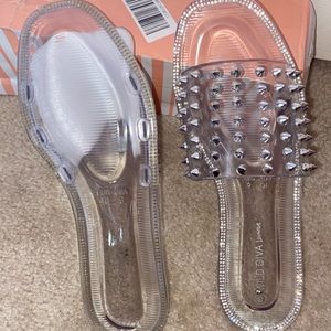 Never Worn Spikes Slides !